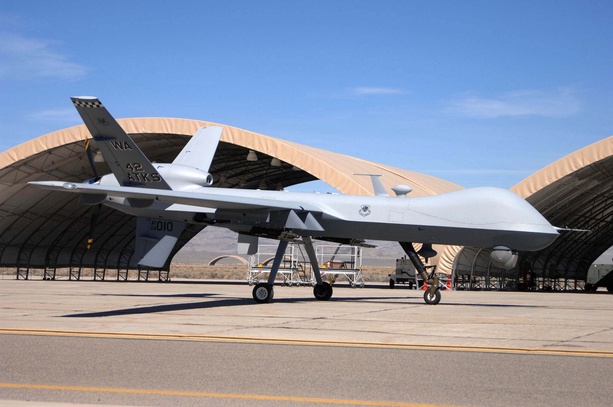 The MQ-9 Reaper Unmanned Aerial Vehicle taxis into Creech Air Force Base, Nev., Feb. 13 marking the first operational airframe of its kind to land here. This Reaper is the first of many soon to be assigned to the 42nd Attack Squadron. (U.S Air Force photo/Senior Airman Larry E. Reid Jr.)