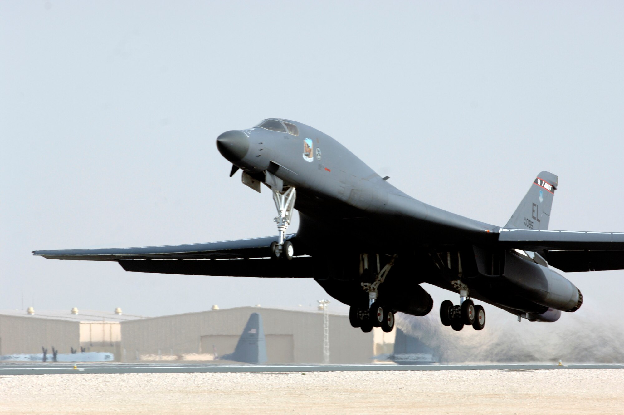 An Air Force B-1B Lancer lifts off the runway at its Southwest Asia location enroute to a mission over Afghanistan. In recent weeks, the 34th Expeditionary Bomb Squadron has maintained a persistent presence in Iraq and Afghanistan to support increased operations. (U.S. Air Force Photo/Staff Sgt. David Miller)