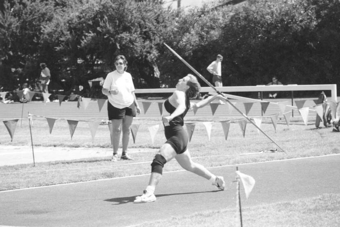 Navy Ensign Christine Stancliff easily captured the women's javelin during the armed forces track and field championships in California. Stancliff, assigned to the U.S. Naval Academy in Annapolis, Md., is one of 15 armed forces athletes competing in the 1996 U.S. Olympic trials this month in Atlanta. Petty Officer 3rd Class Zachary Kennedy, USN