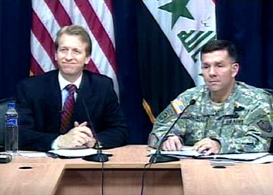 Multi-National Force-Iraq Spokesperson Maj. Gen. William Caldwell and Ambassador Daniel Speckhard, U.S. Embassy Baghdad, speak with reporters at a joint media roundtable to provide an operational update, March 14, 2007. 