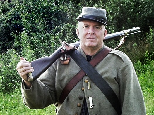 Maj. Warren Smith, Chief of Mobility and disaster preparedness with the 439th Aeromedical Evacuation Squadron, is also a private with the 34th Battalion Virginia Cavalry. The Civil War shooter is shown with his Whitney militia rifle.