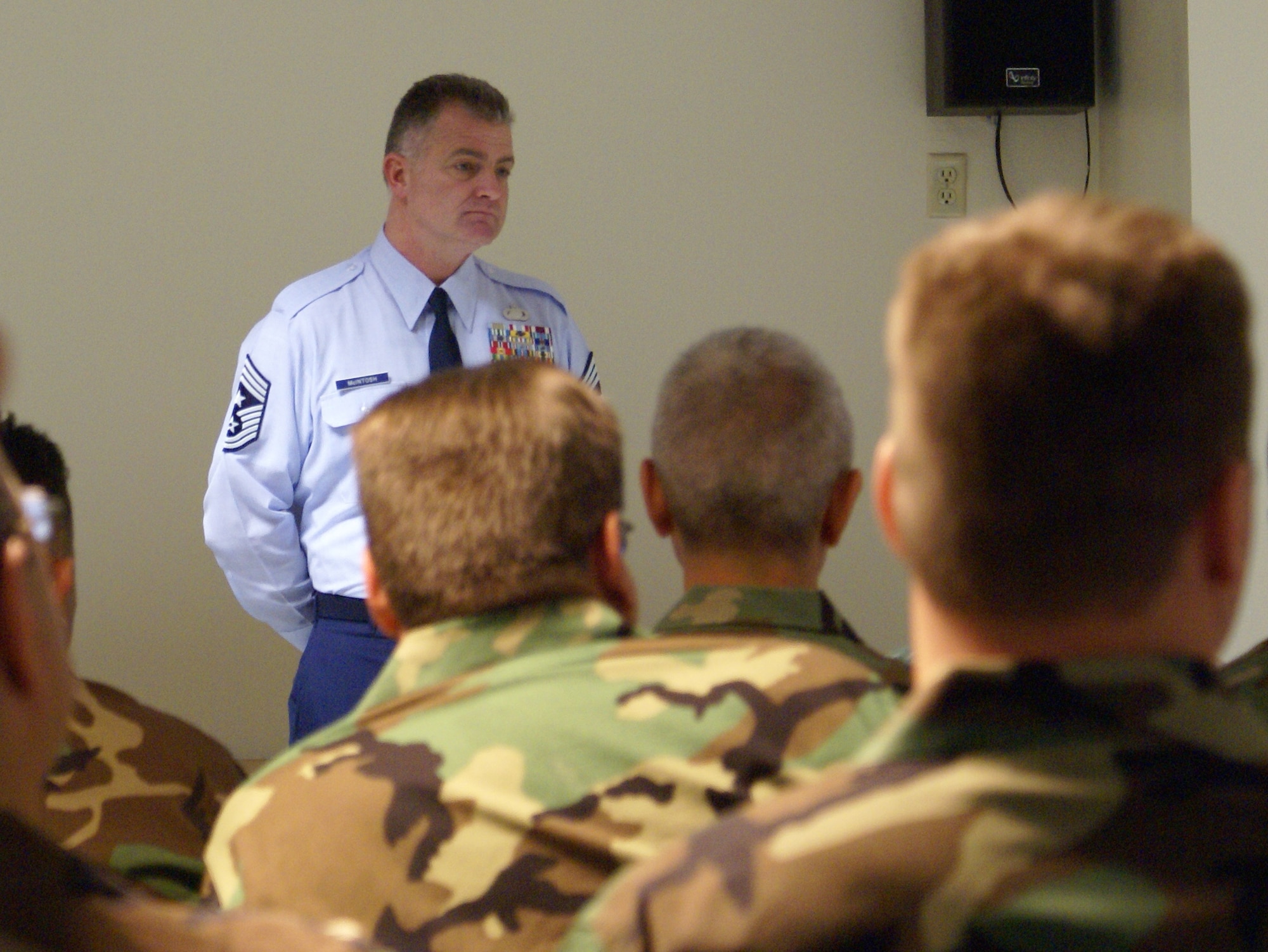 Air Force Reserve Command Chief Master Sgt. Troy J. McIntosh holds an enlisted call at Homestead Air Reserve Base, Fla., March 7. During the visit he discussed key issues such as ancillary training, leadership, mentoring and how to be successful as a reservist. March 7 was the Chief's first day in his new position. He replaces Chief Master Sgt. Jackson A. Winsett who is retiring after more than 30 years of service. (U.S. Air Force photo/Ryan Ayers)