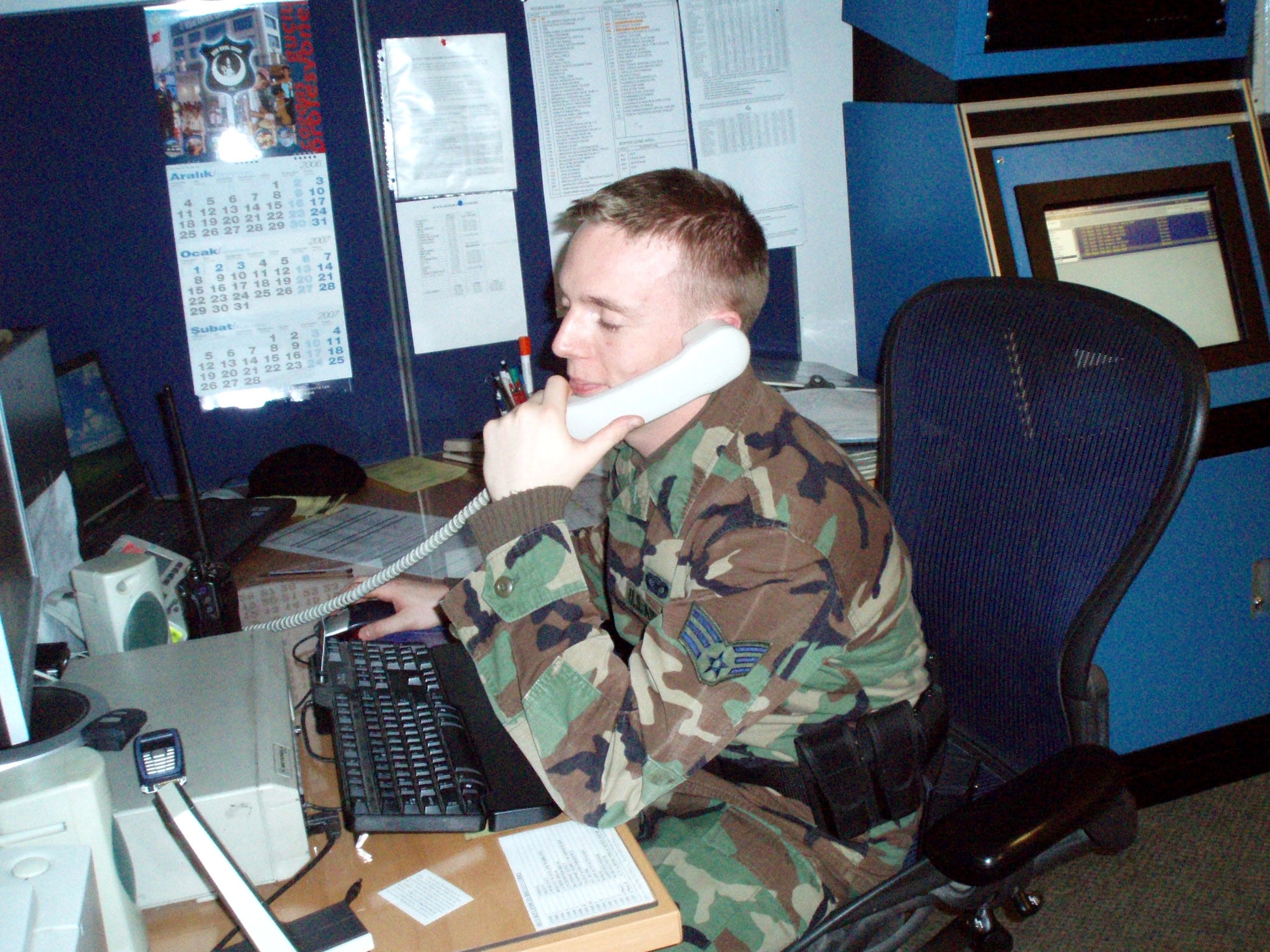 As a security forces control center operator, Senior Airman Joshua Ames handles a constant stream of phone calls during the day at Izmir, Turkey. His training encompasses how to react and handle various situations. (U.S. Air Force photo)