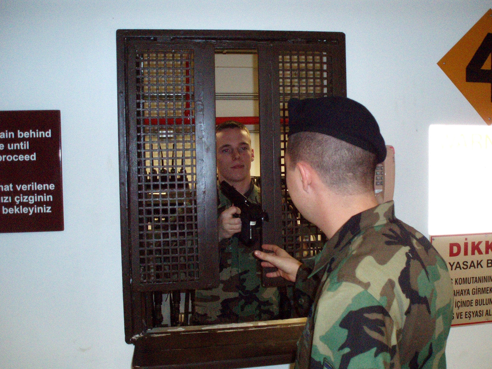 Senior Airman Joshua Ames issues a weapon as part of his job as a security forces control center operator at Izmir, Turkey. Since 1965, retention rates for first-term Airmen have been set at 55 percent and today, even with constant deployments, budgetary constraints and force shaping initiatives, those rates continue to exceed. (U.S. Air Force photo)