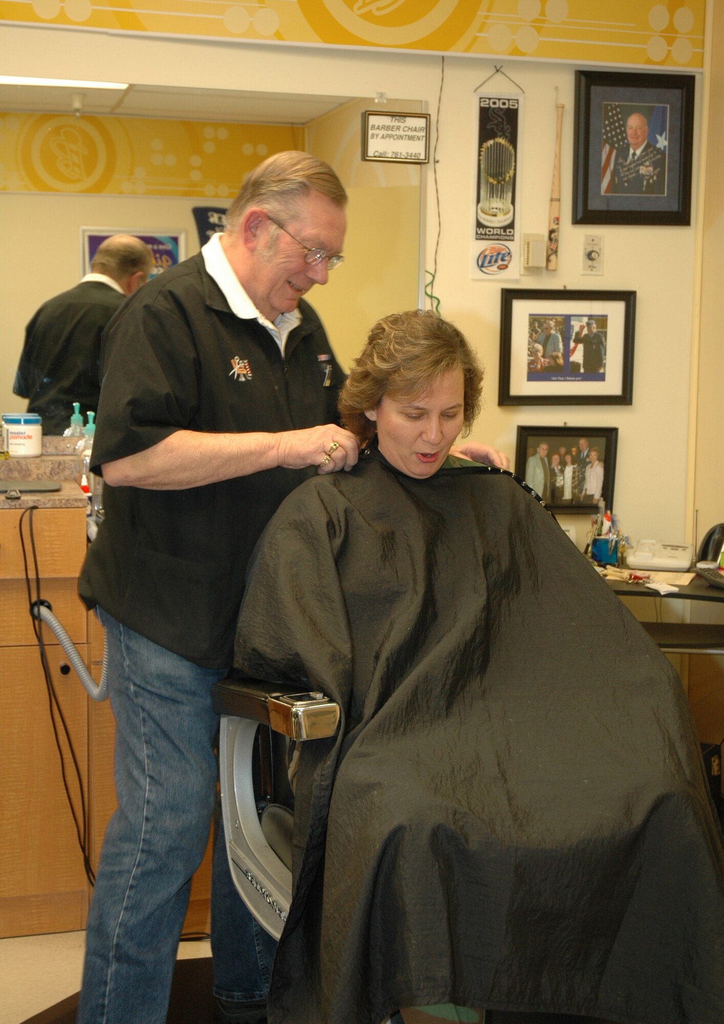 Jim Thul and Col. Sndy Finan get acquainted when the 341st Space Wing commander decided tokeep the barber's hair cutting streak alive and made an appointment with him for a trim. Mr. Thul has been cutting hair at Malmstrom since 1959 and has cut every wing commander's hair since that time.