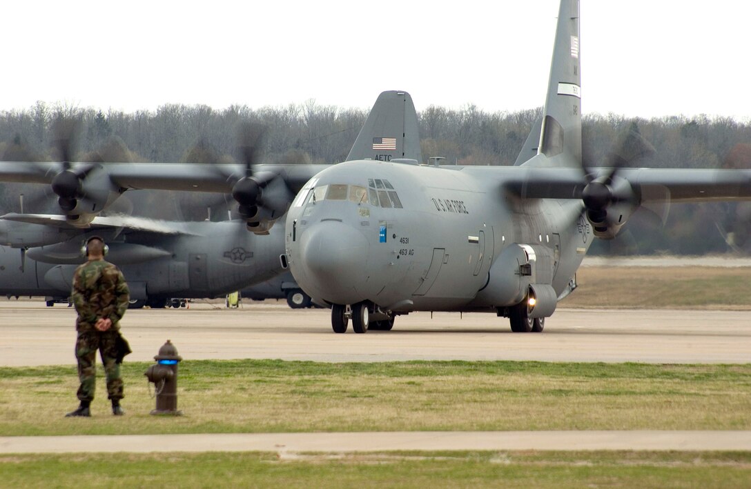 General Duncan McNabb, Air Mobility Command commander, delivers a new C-130J Hercules March 13 to the 463rd Airlift Group at Little Rock Air Force Base, Ark.  It is the unit's first J-model and will be used in combat operations around the world. (U.S. Air Force photo/Airman 1st Class Nathan Allen)