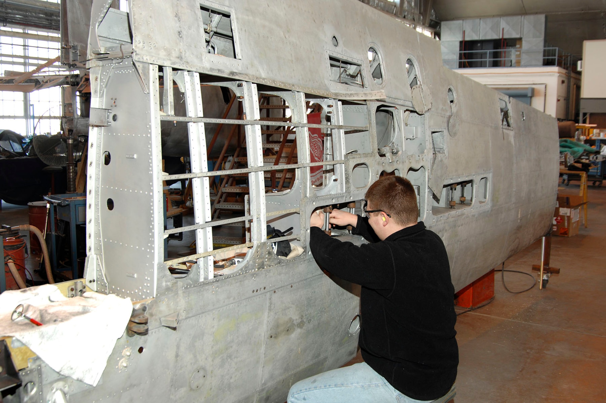 DAYTON, Ohio (02/2007) - Restoration Specialist Nick Almeter works on the Japanese George in the restoration hangar of the National Museum of the U.S. Air Force. (U.S. Air Force photo by Ben Strasser)
