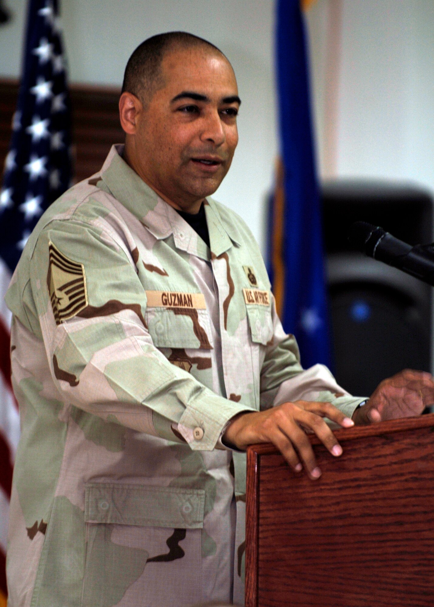 386 Expeditionary Mission Support Group Superintendent CMSgt Jose A. Guzman speaks to 386 Air Expeditionary Wing Airmen at the National Prayer Breakfast on Wednesday morning at an undisclosed location in Southwest Asia.  Chief Guzman encouraged the audience to be spiritual wingman and that we are a nation of faith sustained by the power of prayer.  The United States Air Force Chaplain Service holds many events around Southwest Asia in support of the mission and "Glorifying God, Honoring Airmen, and Serving All".  USAF Photo by TSgt Edward D. Holzapfel