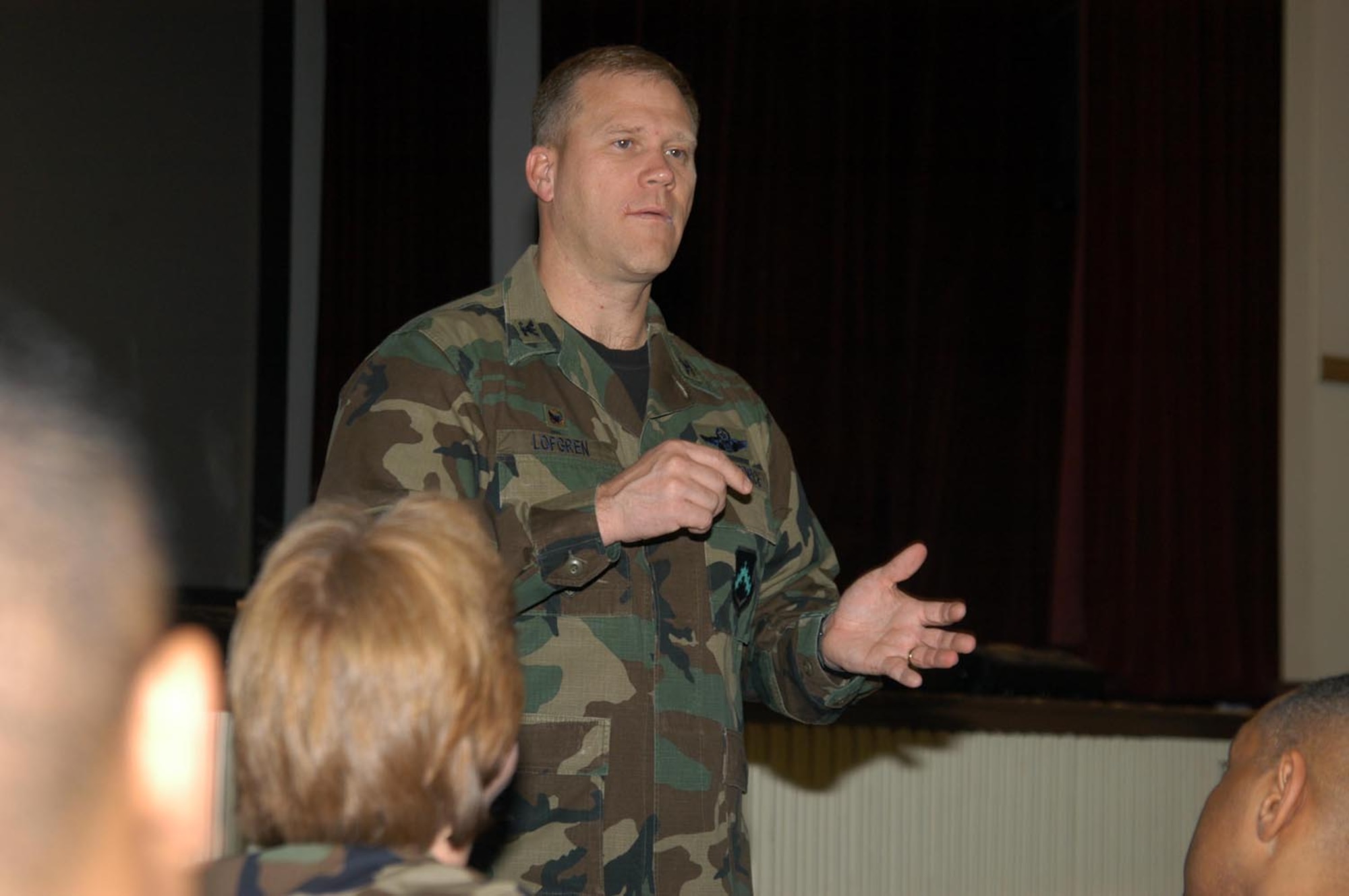 KUNSAN AIR BASE, Republic of Korea March 12, 2007 -- Col. Jeff 'Wolf' Lofgren, 8th Fighter Wing commander, discusses the concerns of senior NCOs Monday morning at the base theater. The Wolf met with the SNCOs first, followed by Kunsan's NCOs and Airmen ranks at the theater and fitness center. (Air Force photo/Senior Airman Stephen Collier)                                