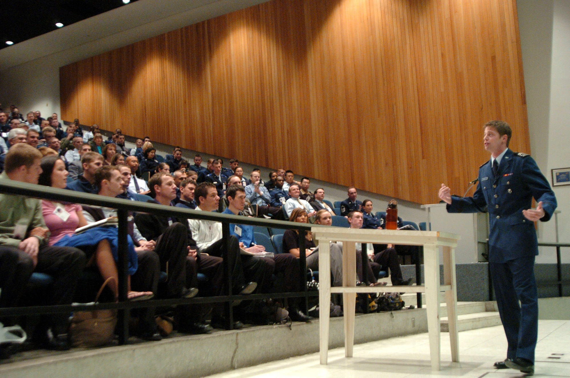 Cadet 2nd Class Erik Mirandette talks to a packed auditorium at the U.S. Air Force Academy in Colorado Springs, Colo. Cadet Mirandette was injured in a terrorist bombing in Cairo, Egypt while on a humanitarian mission delivering medicine to small towns across Africa. The bombing killed his younger brother Alex. (U.S. Air Force photo/1st Lt. John Ross)