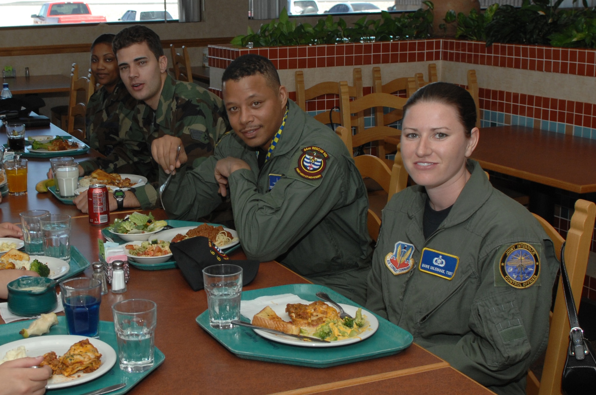 Oscar-nominated actor Terrence Howard has lunch with  Airmen at the Crosswinds Dining Facility " at Nellis Air Force Base, Nev. on March 16. Mr. Howard will be starring in  “Iron Man,” which begins filming soon. The U.S. Air Force will be depicted in a number of scenes in the film.  (U.S. Air Force photo by Tech. Sgt. Scottie McCord)