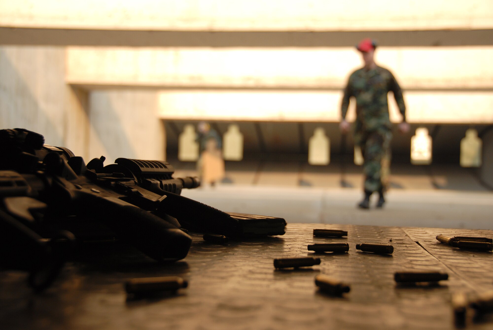 Airmen test their skills at the Osan Air Base, South Korea, shooting range March 15.  (U.S. Air Force photo/Airman 1st Class Chad Strohmeyer).