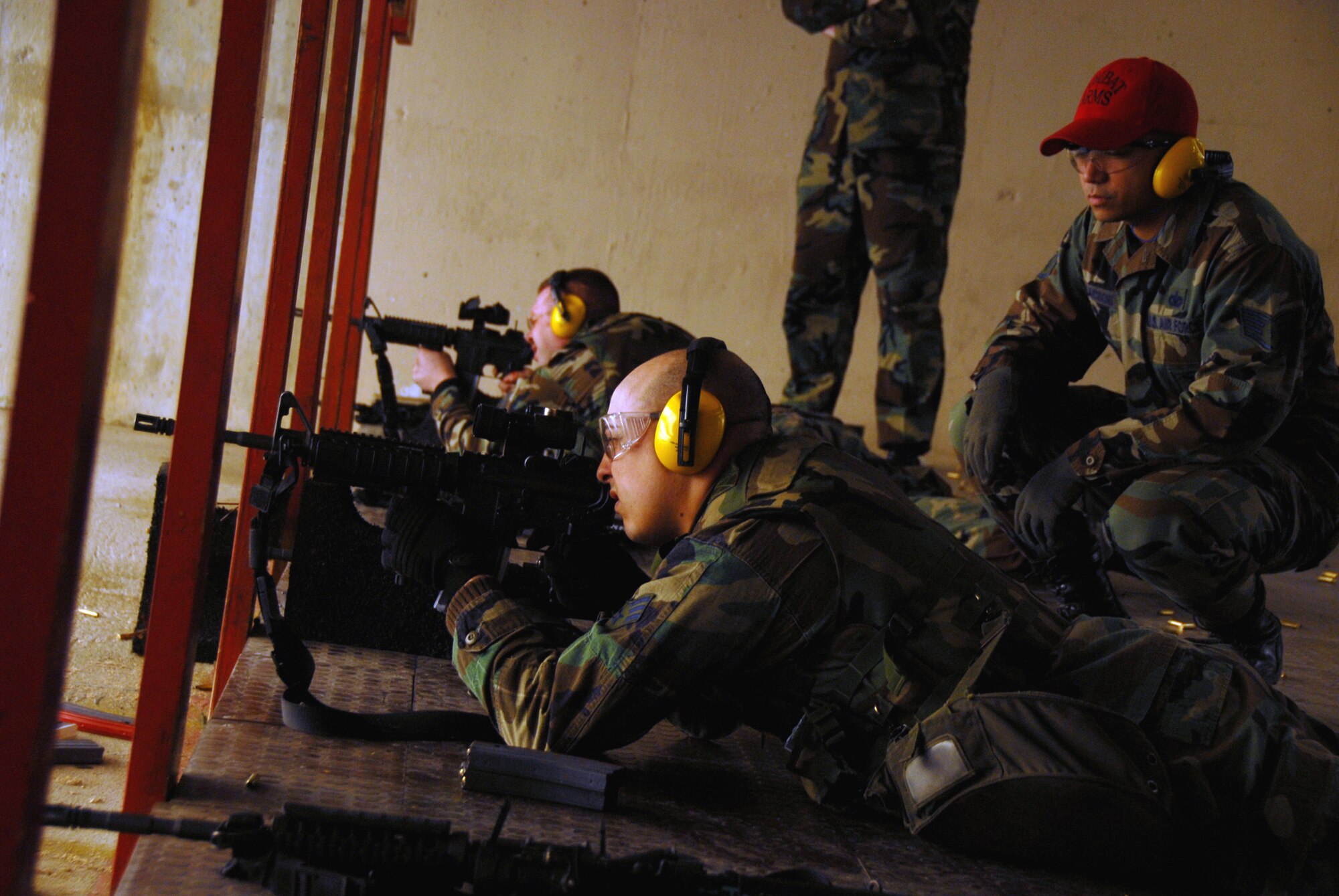Airmen test their skills at the Osan Air Base, South Korea, shooting range March 15.  (U.S. Air Force photo/Airman 1st Class Chad Strohmeyer).