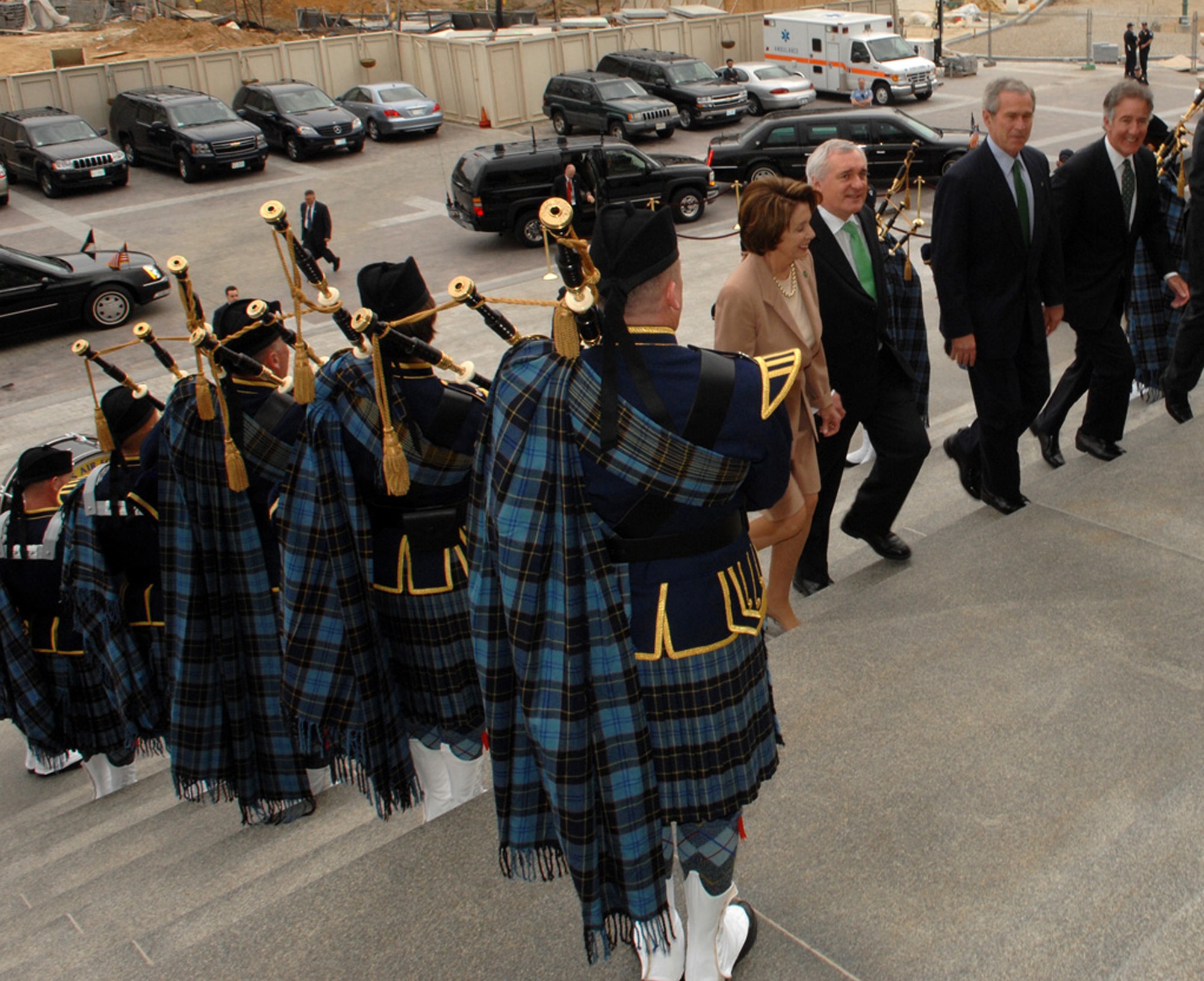 From right: Speaker of the U.S. House of Representatives Nancy Pelosi, Irish Prime Minster Bertie Ahern, President George Bush and Irish Foreign Minister Dermot Ahern ascend the outside steps of the U.S. Capitol Building in Washington D.C., on March 15, 2007, while the Band of the Air Force Reserve Pipe Band performs traditional Celtic music. Since 1993 the Air Force Reserve Pipe Band has been invited to perform on Saint Patrick's Day for the president of the United States and the prime minister of Ireland during their annual lunch. This year the pipe band was also invited to perform in the New York City Saint Patrick's Day Parade. (U.S. Air Force photo/Airman First Class Timothy Chacon)