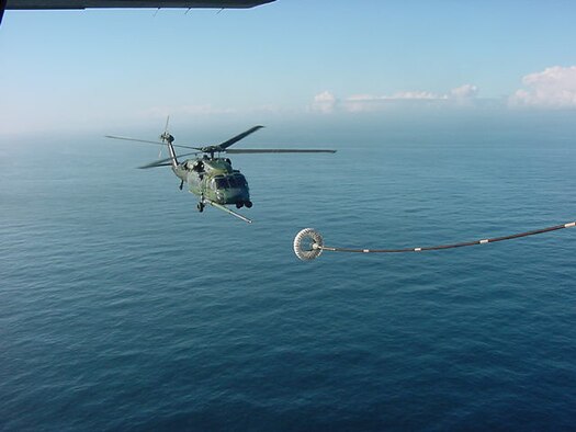 Within minutes of notification March 16, Air Force Rescue rescue crews launched two aircraft; an HH-60G Pave Hawk helicopter and an extended range HC-130P/N Hercules aircraft.  Two pararescuemen equipped with dive gear and medical equipment are aboard the Pave Hawk ready to rescue and prepared to administer medical treatment, if needed.  The HC-130P/N Hercules is capable of extending the range of the Pavehawk through air refueling as shown in this photo.