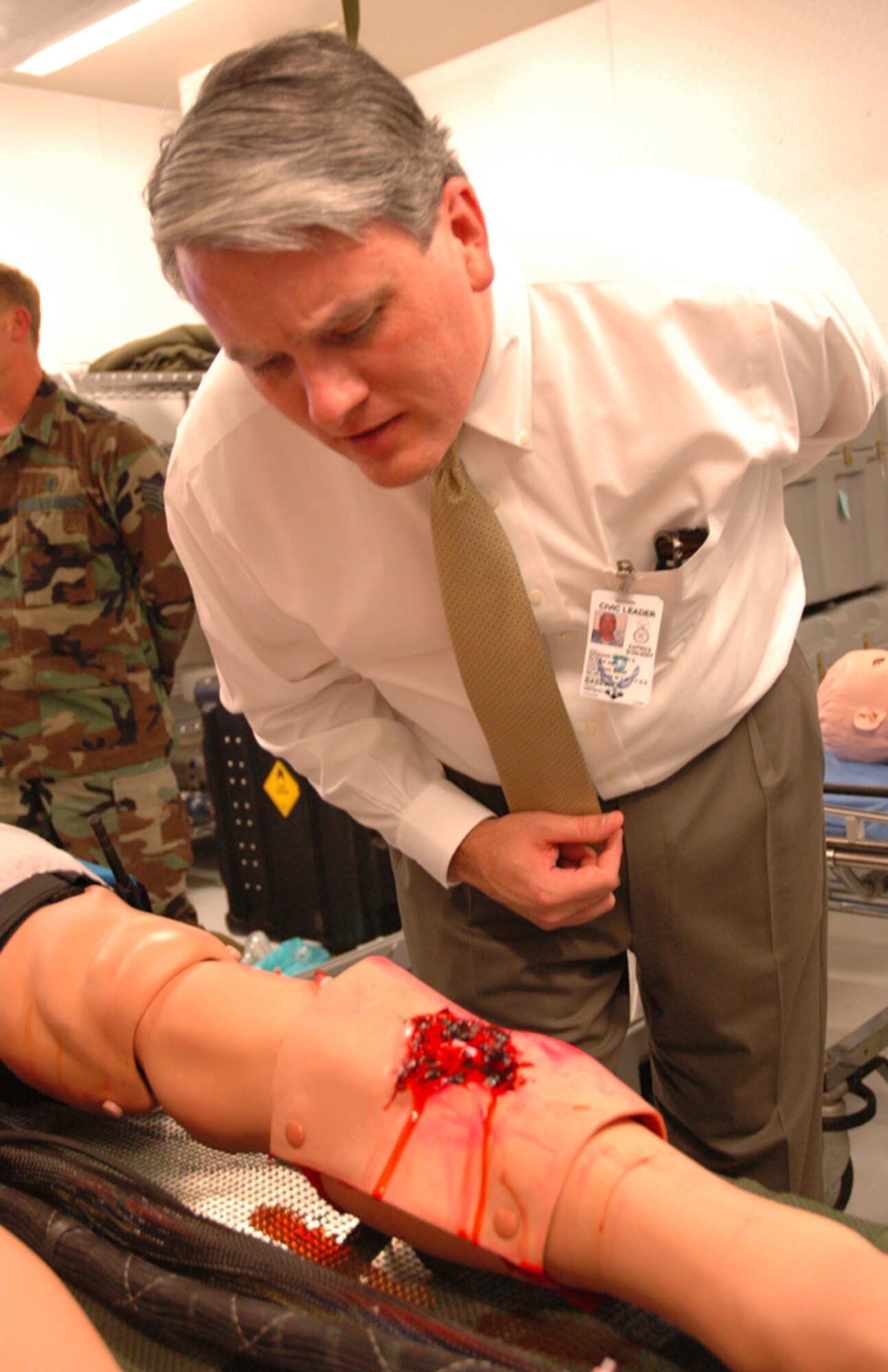 Scott Gashaw, a 1st SOW honorary commander from Destin First Bank, looks at a medical dummy that is used for triage training. (Courtesy photo)