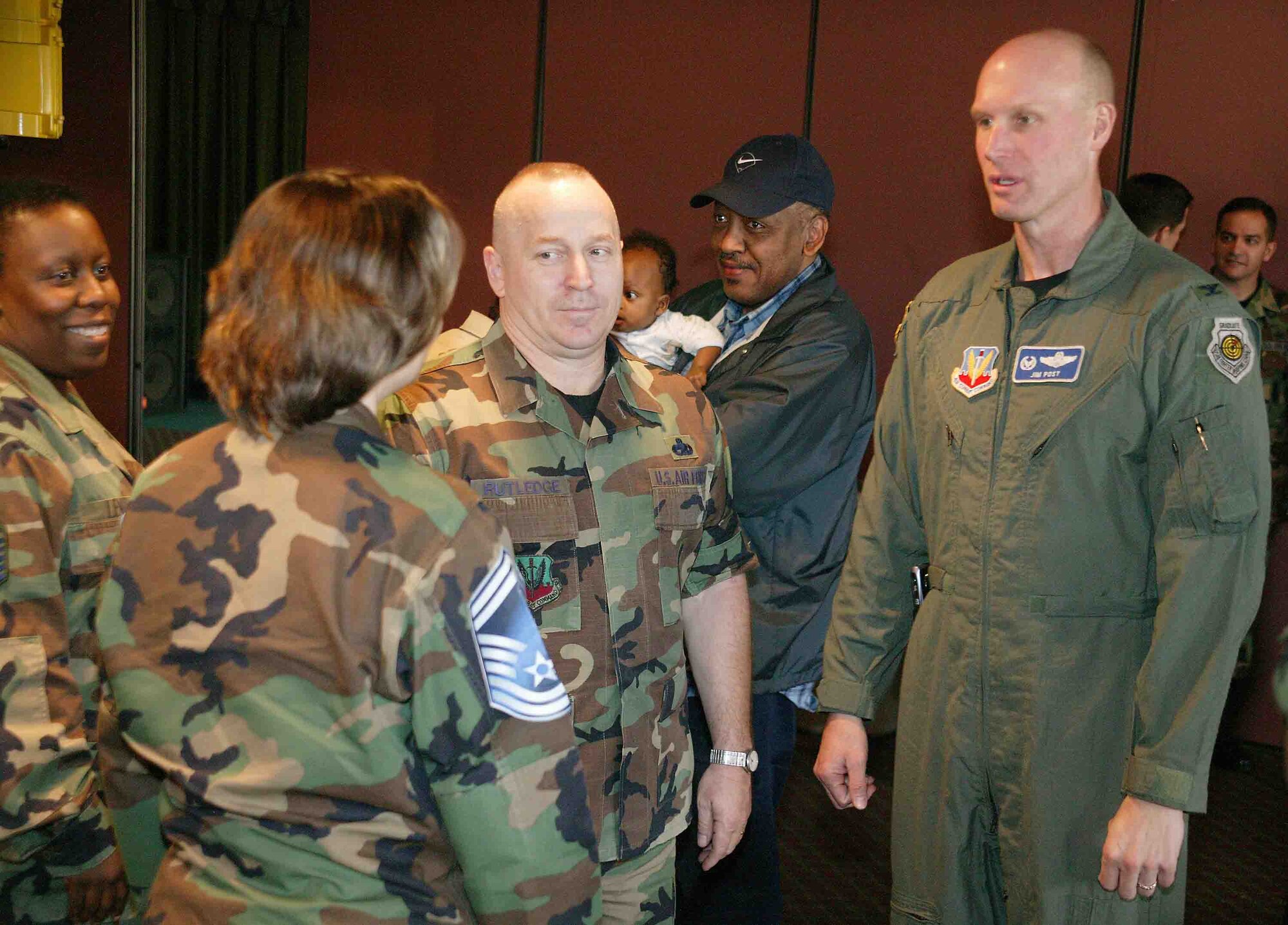 SHAW AIR FORCE BASE, S.C. -- Col. James Post III, 20th Fighter Wing commander, and Chief Master Sgt. Gary Rutlegde, 20th FW command chief, congratulate Master Sgt. Lisa Rice, 20th Mission Support Squadron, on her selection for promotion to senior master sergeant March 15. According to the Air Force Personnel Center, 8.77 percent of the considered 14,626 master sergeants were selected for promotion. (U.S. Air Force photo/Senior Airman John Gordinier)
