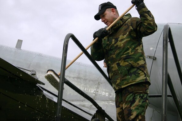 SPANGDAHLEM AIR BASE, GERMANY -- Senior Master Sgt. Roger Bolish, 606th Air Control Squadron, was one of approximately 20 volunteers from the 606th ACS to wash an A-10 at Spangdahlem’s Air Park March 9.  (Photo by Staff Sgt. Daniel Heise) 