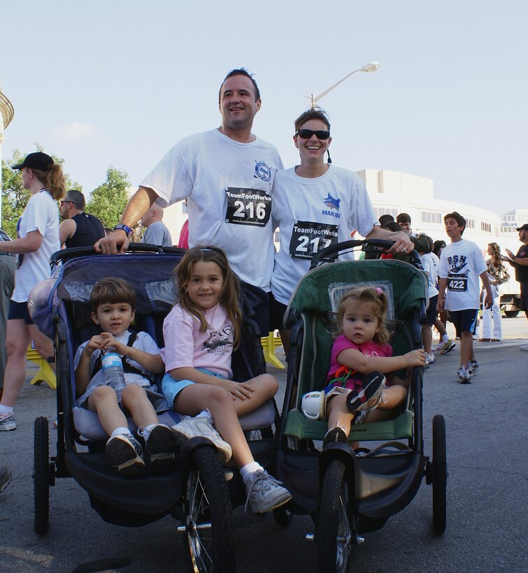 Lt. Col. Joe Matchette and his family finished the 3.2 mile run as a family in 29 minutes, 12 seconds. Proceeds from the 5th Annual Tribute to the Military 5K Fun Run in Coral Gables, Fla. will go to support families of deployed military personnel and other family support services. (U.S. Air Force photo/Master Sgt. Ray Sarracino)