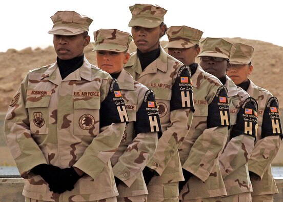 SOUTHWEST ASIA -- On March 16th, at an undisclosed location in Southwest Asia, an all female Honor Guard detail conducted a retreat ceremony honoring the colors during National Women's History Month.  The women of the 386 AEW also made up an all female formation for the ceremony.  This was one of many activities conducted at the base as part of National Women's History Month.  (USAF Photo by TSgt Edward D. Holzapfel)