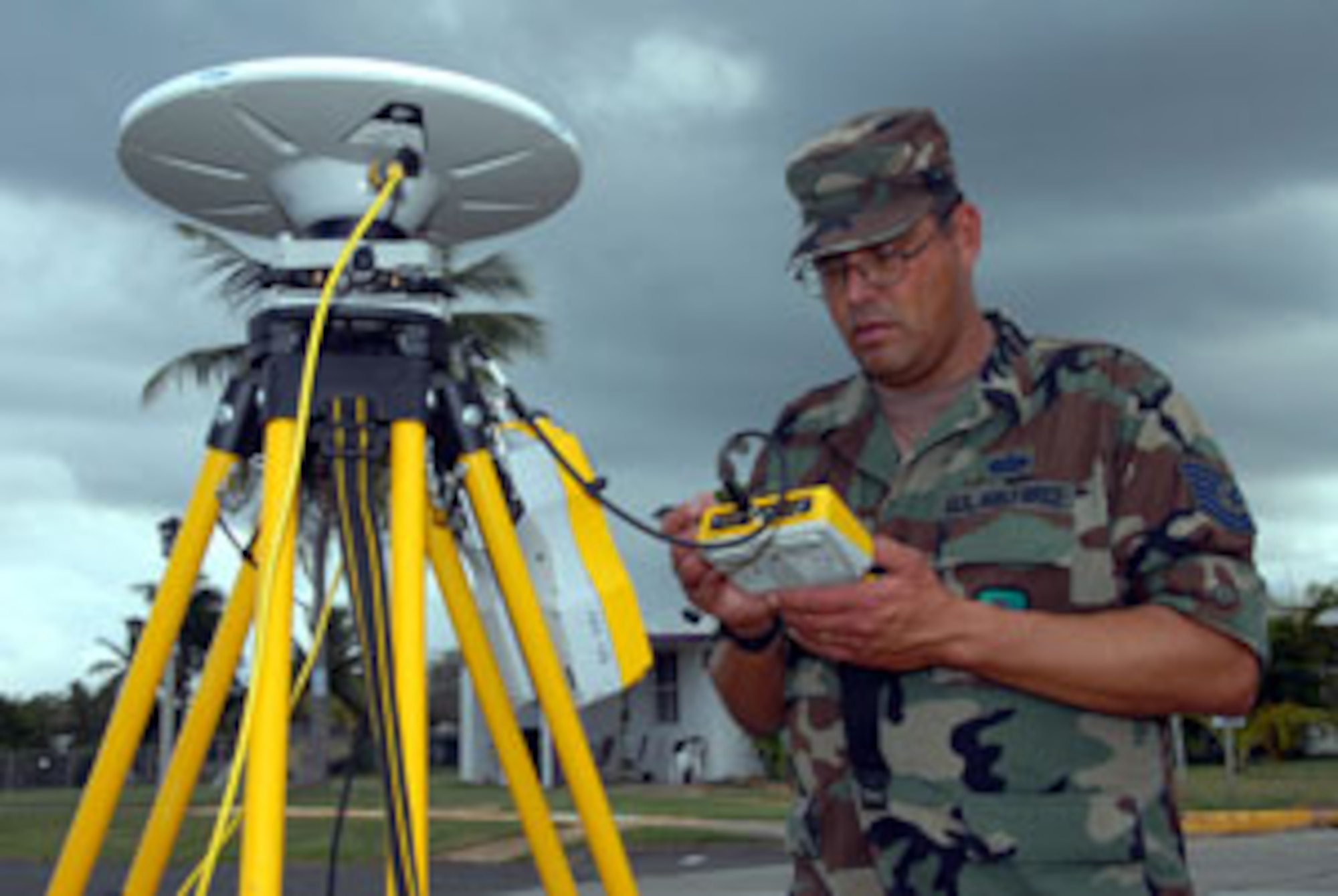 Tech. Sgt. Raymond Linares, 163d RW, March Air Reserve Base, Calif., uses state of the art GPS equipment to survey the area surrounding the plaza during real world training held March 3-17 on Coast Guard Air Station Borinquen, Puerto Rico. (U.S. Air Force photos by Senior Airman Diane Ducat/163d RW)