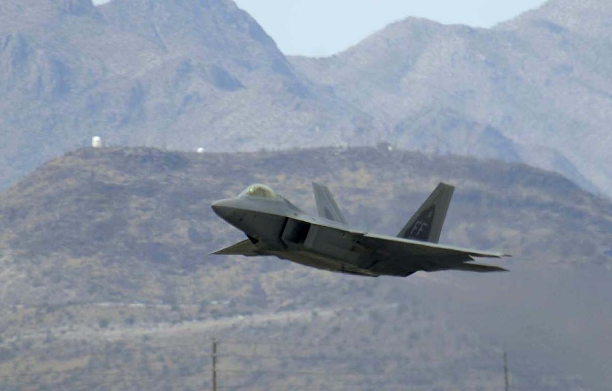 Working alongside the manufacturer, Lockheed Martin Aeronautics Company, during production of the F-22 Raptor, Air Combat Command's Raptor Acceptance Team is a geographically separated unit whose mission is to provide gaining units with "ready to fight" F-22s. It is estimated that the  Air Force will save $119 million by pre-accepting the Raptor, such as the one pictured here, throughout the current contractual agreement. (U.S. Air Force photo/Senior Airman Christina D. Ponte)  

