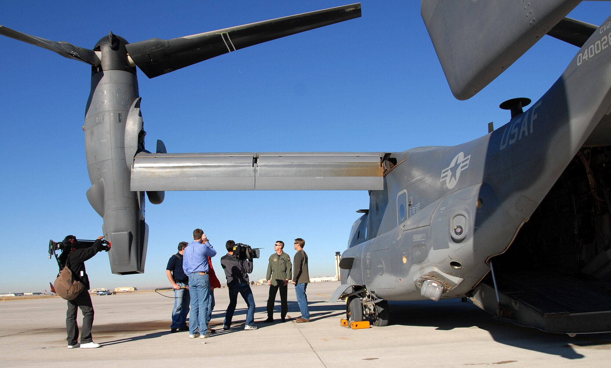 Crewmembers filming from Beyond Productions, for the new Discovery Channel show, ?Cool Things and How They Work,? interview Lt. Col. Todd Lovell, 71st Special Operations Squadron director of operations March 12. The crew spent March 12 and 13 with the 71st Special Operations Squadron gathering footage on the ground and while flying in the CV-22 Osprey. (U.S. Air Force photo by Staff Sgt. Markus Maier)