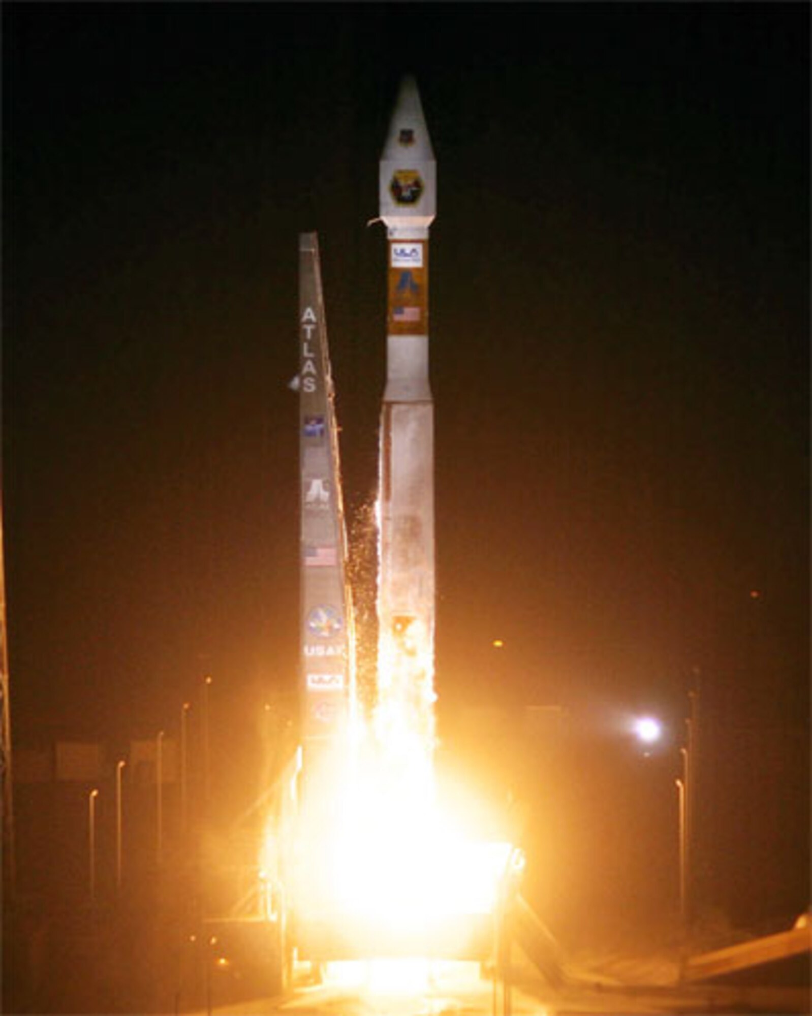 The first Air Force Atlas V rocket carrying six experimental satellites for the Space Development and Test Wing STP-1 mission lifts off March 8 at 10:10 p.m. from Cape Canaveral Air Force Station, Fla. (Photo by Pat Corkery)                              