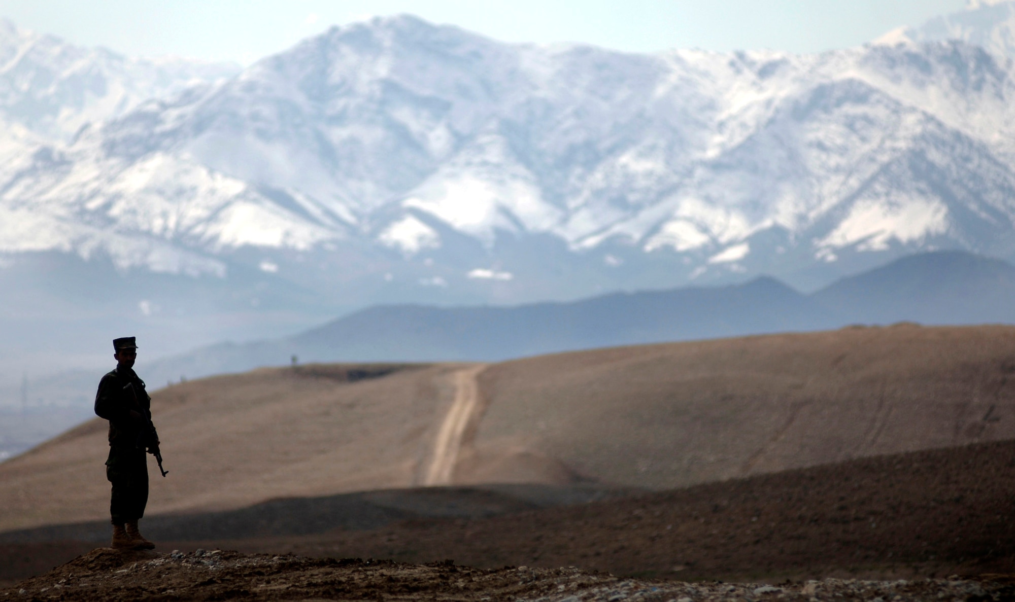 An Afghan National Army officer candidate provides perimeter security March 15 during a medical evacuation exercise being held at the Kabul Military Training Center in Afghanistan.  U.S. Air Force members provide military guidance and mentorship for the ANA instructors, officers and trainees at KMTC. (U.S. Air Force photo/Tech. Sgt. Cecilio M. Ricardo Jr.) 