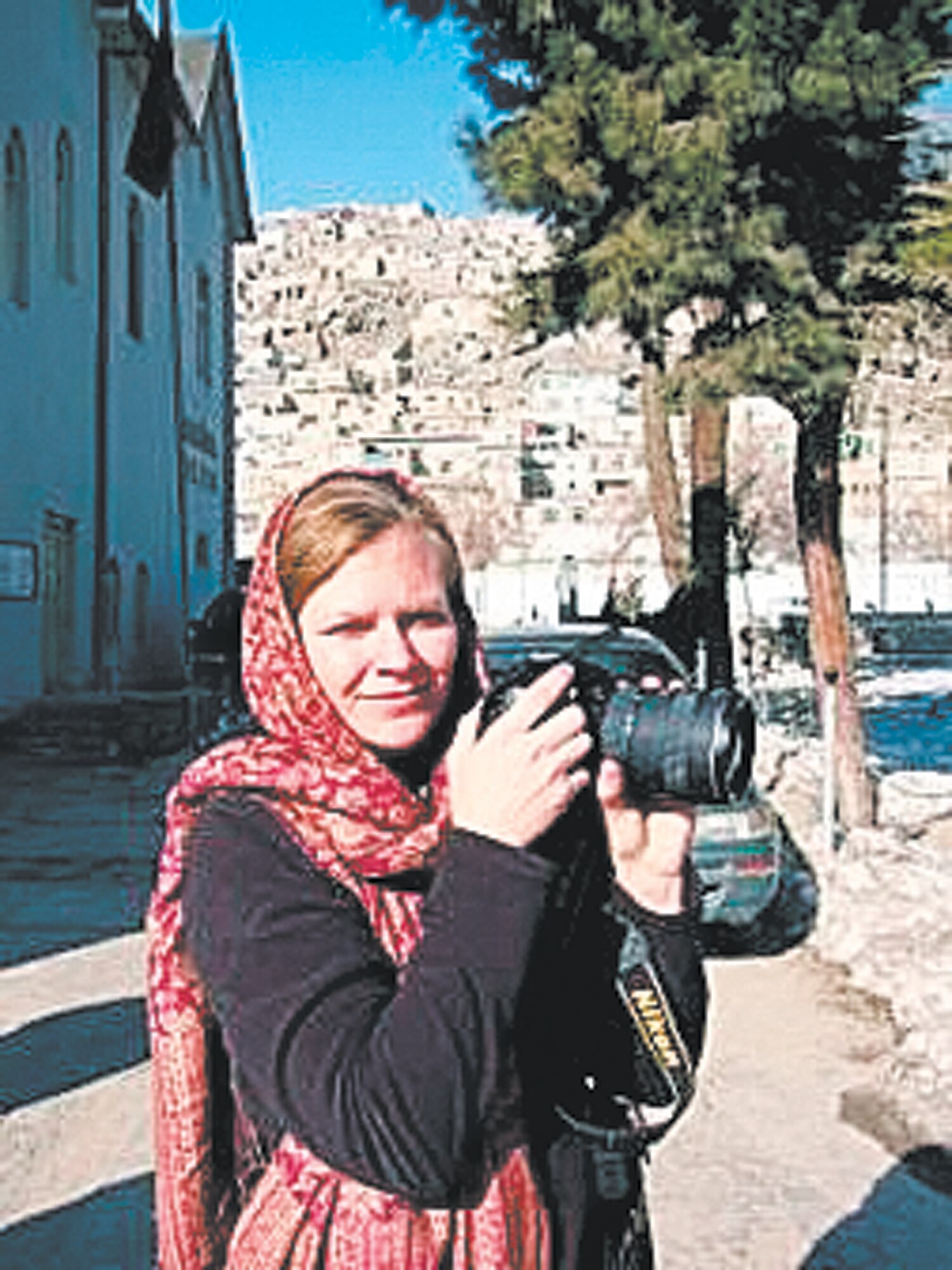 Senior Airman Stacia Zachary takes photos at a local museum and art gallery.