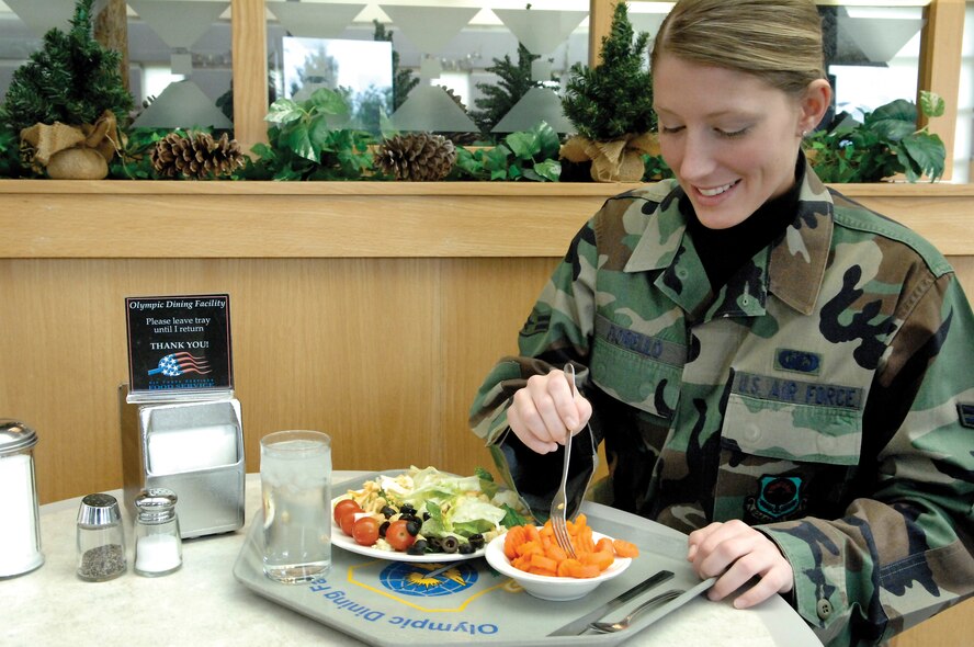 MCCHORD AIR FORCE BASE, Wash. -- Airman 1st Class  Lori Fiorello, 62nd Comptroller Squadron, enjoys a meal March 13, 2007 at the Olympic Dining Facility located in Building 578. (U.S. Photo/Abner Guzman)