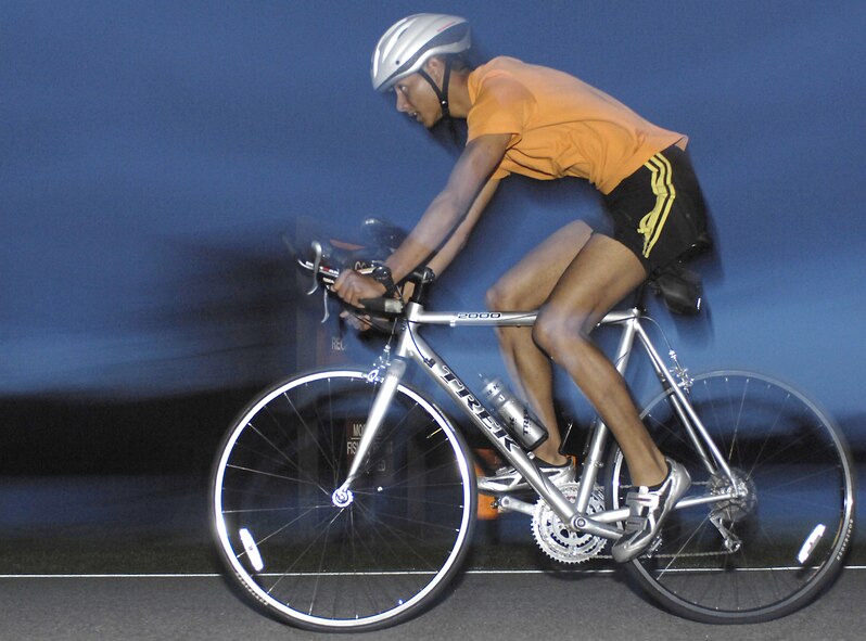 1st Lt. Justin Banez, 822nd Security Forces Squadron, participates in the 13.5 mile bike ride portion of the Shamrock biathlon March 16. (U.S. Air Force photo courtesy of Staff Sgt. Manuel Martinez)