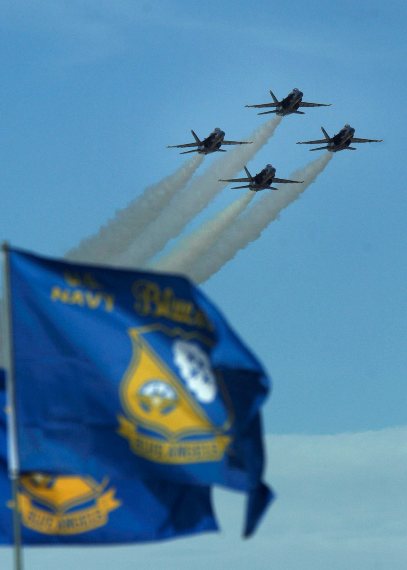 The U.S. Navy Blue Angels Flight Demonstration Team flies by in their four-plane diamond formation March 18 during the 2007 Aerospace and Arizona Days air show at Davis-Monthan Air Force Base, Ariz.  The two-day air show offered public an up-close look at military and civilian aerial demonstrations and static-display aircraft from across the U.S. The theme for this year's show was "Davis-Monthan and Tucson: 80 Years of Airpower for America!"  (U.S. Air Force photo/Senior Airman Christina D. Ponte)