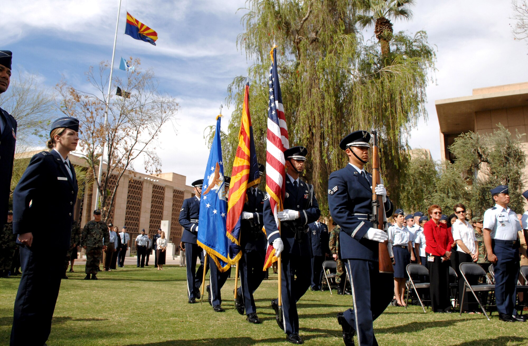 The Luke Air Force Base honor guard marches to the stage during the presentation of colors at the Air Force Week proclamation ceremony March 19 in Phoenix. Several bus loads of Airmen from nearby Luke Air Force Base joined Arizona state officials and Air Force senior leaders to kick off this year's first Air Force Week event. (U.S. Air Force photo/Staff Sgt. Brian Ferguson) 
