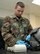 Airman Joshua Riffe, 58th Fighter Squadron Life Support Airman, finishes cleaning and prepping helmets after the pilots return from their sorties. Airman Riffe makes up part of the 33d Fighter Wing Life Support Section that was awarded best small unit in Air Combat Command for 2006. 