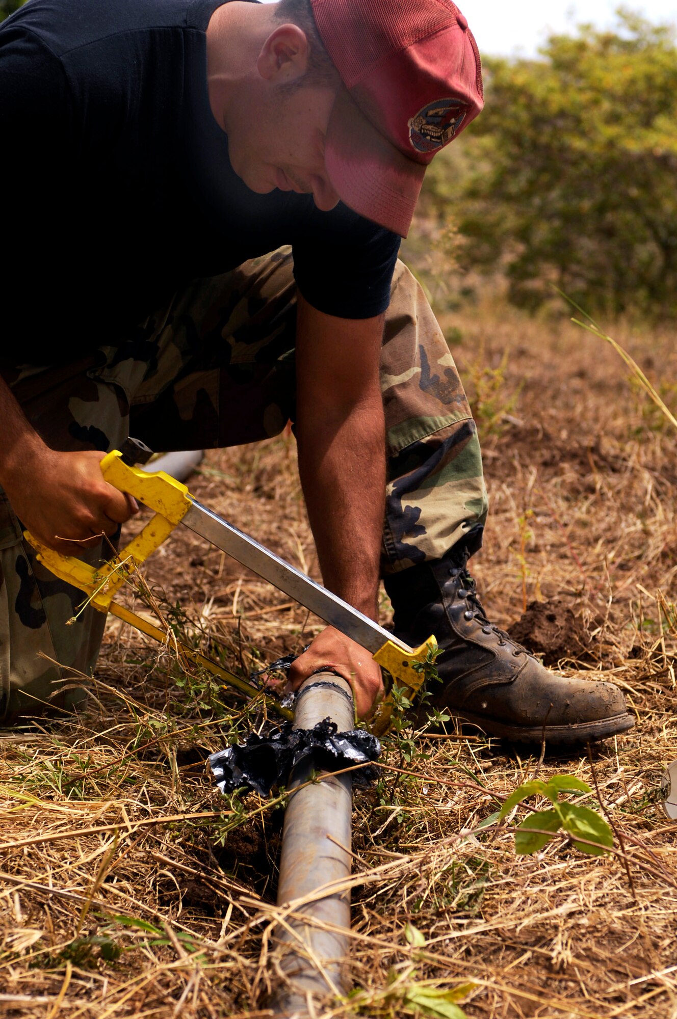 Staff Sgt. Adam Winter repairs a broken pipe March 17 at a farm run by Nicaraguan nuns.  Sergeant Winter is a utility systems craftsman participating in New Horizons-Nicaragua 2007, a $7.25 million joint U.S. and Nicaraguan military humanitarian and training exercise that will provide a new school and medical clinic, as well as free health and veterinary care, giving aid and strengthening bonds between the two nations. (U.S. Air Force photo/Staff Sgt. Jason T. Bailey)