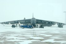 MINOT AIR FORCE BASE, N.D. – A B-52H Stratofortress is prepped for takeoff Feb. 28 before being canceled due to inclement weather. The 5th Bomb Wing commander has the authority to close the base during inclement weather. Once that happens, release and reporting instructions are relayed via the MAFB Information Hot Line (723-1190), base marquee, Rolling News (commander's access channel) and local TV/radio stations. (U.S. Air Force photo by Senior Airman Christopher Boitz)