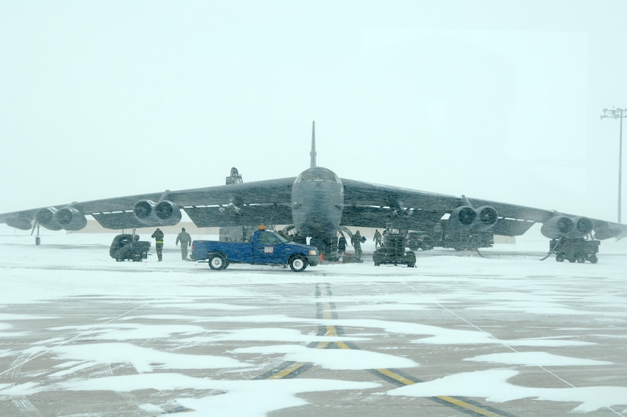 MINOT AIR FORCE BASE, N.D. – A B-52H Stratofortress is prepped for takeoff Feb. 28 before being canceled due to inclement weather. The 5th Bomb Wing commander has the authority to close the base during inclement weather. Once that happens, release and reporting instructions are relayed via the MAFB Information Hot Line (723-1190), base marquee, Rolling News (commander's access channel) and local TV/radio stations. (U.S. Air Force photo by Senior Airman Christopher Boitz)