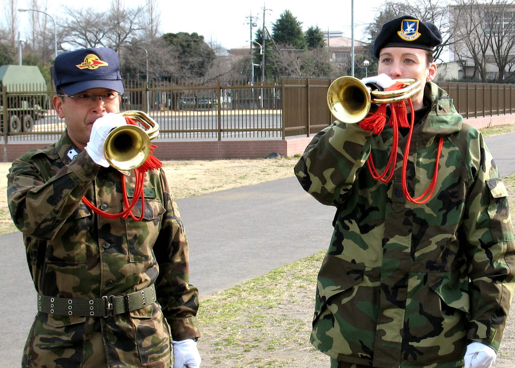 Technical Sgt. Deborah Manning plays the bugle during an NCO cultural exchange March 15 at Iruma Air Base, Japan. The purpose of the program is to foster cooperation and understanding between the two countries. (U.S. Air Force photo/Airman 1st Class David Clark)