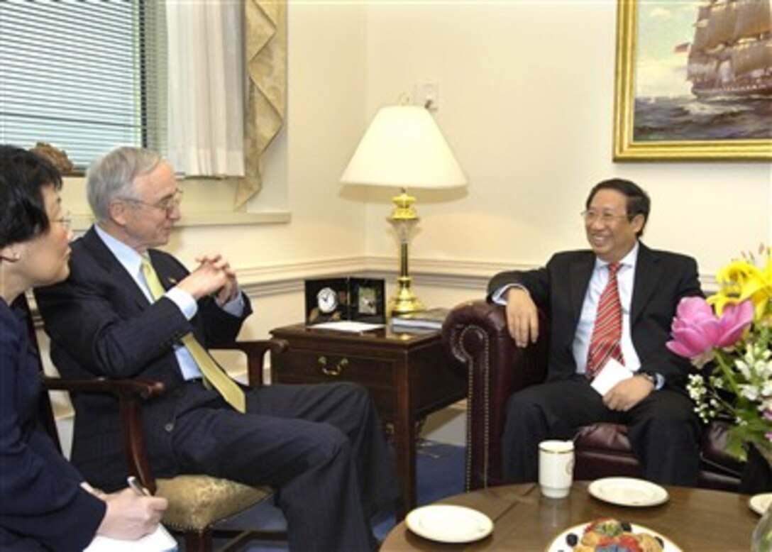 Deputy Secretary of Defense Gordon England (2nd from left) hosts a Pentagon meeting with Vietnamese Deputy Prime Minister and Minister of Foreign Affairs Pham Gia Khiem (right) on March 16, 2007.  