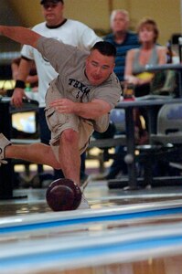 Kirtis Bailey, 437th Logistics Readiness Squadron, aims to pick up a spare during the second day of the bowl-off. 

(RELEASED)(U.S. Air Force photo by Airman 1st Class Nicholas Pilch)