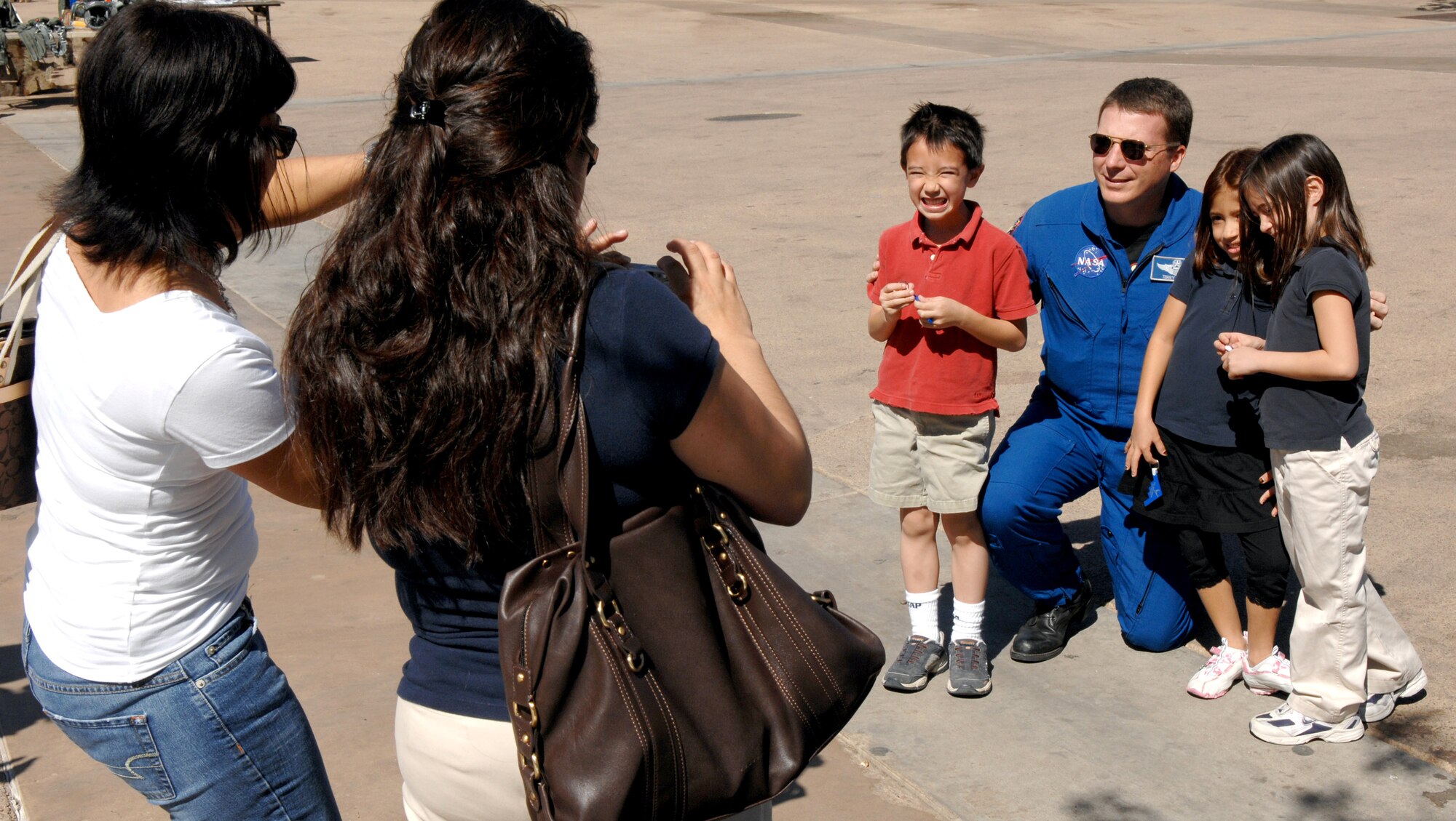 NASA Astronaut Lt. Col. Terry Virts pauses for a photograph March 20 during Air Force Week at the Arizona Science Center in downtown Phoenix.  Colonel Virts signed autographs and answered questions about his role as an astronaut and Air Force member.  (U.S. Air Force photo/Staff Sgt. Brian Ferguson)