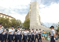 The 737th Training Group Basic Military Training Drum & Bugle Corps march through downtown San Antonio during the 39th annual St. Patrick's Day street parade March 17. The theme of the 39th annual St. Patrick's Day Parade was "The Green Honors the Blue." The parade had a blend of participants from civic, social, business, educational, patriotic and military organizations. (USAF photo by Alan Boedeker)                                