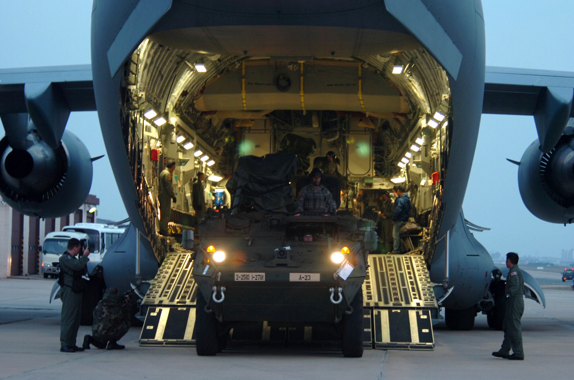 An M1126 Stryker infantry carrier vehicle exits a C-17 Globemaster III March 18 in Daegu, South Korea, for Exercise Foal Eagle 2007.  The focus of the exercise is on strategic, operational and tactical aspects of general military operations in the Korean theater of operations.  Its intent is to demonstrate resolve to support the Republic of Korea against external aggression while improving ROK - U.S. combat readiness and joint and combined interoperability. The C-17 is from the 15th Airlift Wing at Hickam Air Force Base, Hawaii. (U.S. Navy photo/Petty Officer 2nd Class Sandra M. Palumbo)
