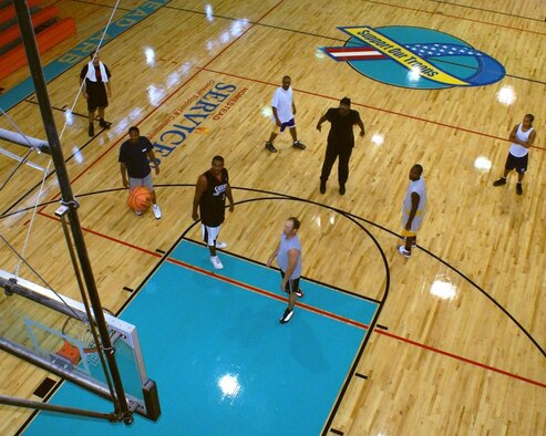 Visitors to the base fitness center can now take advantage of a newly replaced basketball court sporting new logos, including a “Support Our Troops” ribbon. Fitness center staff also added new equipment to the weight room and treadmills for the cardio room. (U.S. Air Force photo/Dan Galindo)