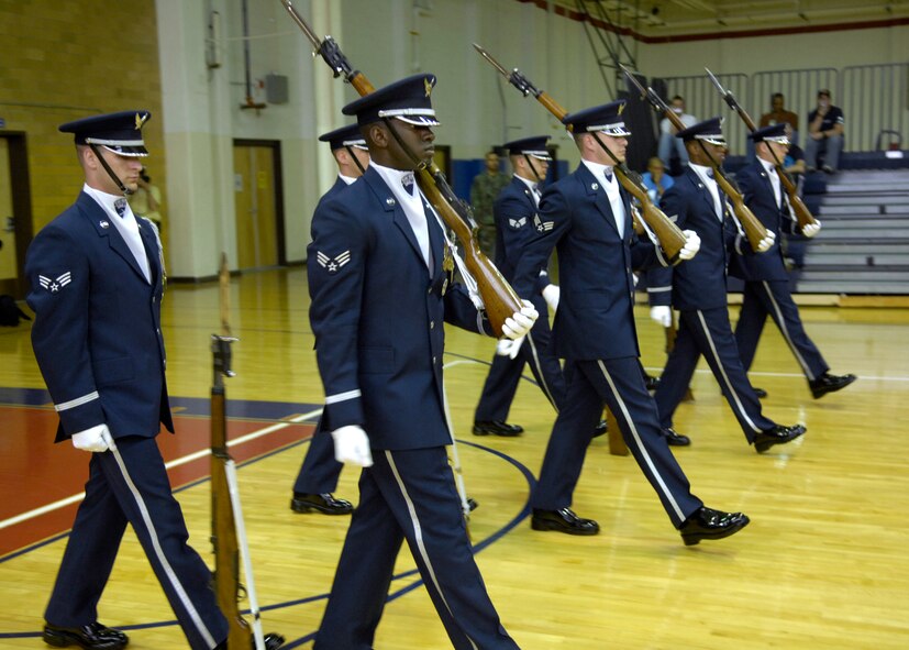 The United States Air Force Honor Guard Drill Team performs at the East Fitness Center on Kirtland Air Force Base, N.M., March 15, 2007. The Drill Team is the traveling component of the Air Force Honor Guard and tours Air Force bases world wide showcasing the precision of today's Air Force to recruit, retain, and inspire Airmen for the Air Force mission. (U.S. Air Force photo by Airman 1st Class Rusti Caraker)(Released)