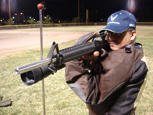 Staff Sgt. Herman Gabaldon, a 95th Security Forces Squadron installation patrolman dry fires with a National Match AR-15. Sergeant Gabaldon is a member of the Air Force Power Rifle Team. (Photo by Tech. Sgt. Richard Coleman)