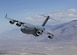 The C-17 Globemaster III T-1 flies over Owens Valley, Calif., for a test sortie. (U.S. Air Force photo)