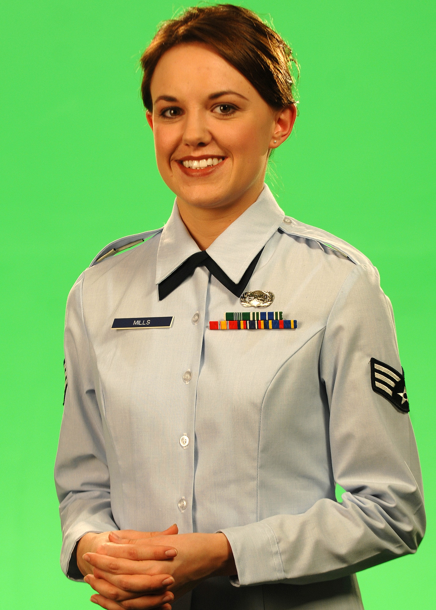 Senior Airman Lana Mills, Air Force News Agency, serves as one of six virtual tour guides on the AIRFORCE.com Web site home page. The guides are designed to lend a personal touch to a Web site loaded with information for prospective recruits, parents, influencers and people wanting to find out more about the Air Force. (U.S. Air Force photo/Master Sgt. Scott Reed)
