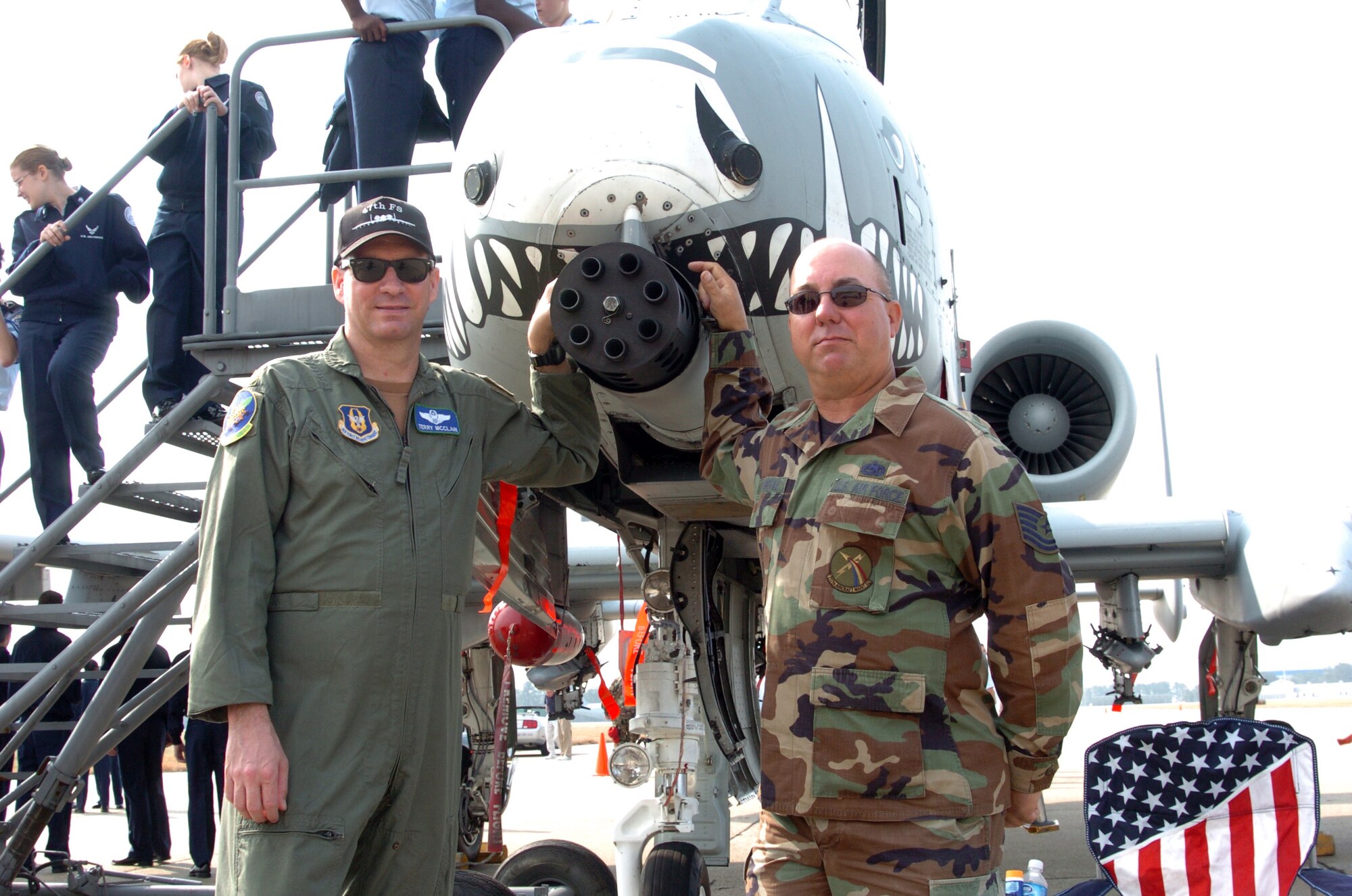 Maj. Terry W. McClain, 47th Fighter Squadron A-10 pilot and Tech. Sgt. Edward Fairchild, 717th Aircraft Maintenance Squadron crew chief, both air reserve technicians, stand proudly in front of their A-10 "Warthog" from Barksdale AFB, La.  Both Airmen were part of the Junior Reserve Officer Training Week at Dobbins ARB were more than 3,000 JROTC and Civil Air Patrol cadets were treated to a C-130 orientation flight, aircraft displays and static displays and interacted with Airmen assigned to 94th Security Forces Squadron, 94th Aeromedical Evacuation Squadron, and 94th Aerial Delivery Port Flight. (Photo by Master Sgt. Stan Coleman)